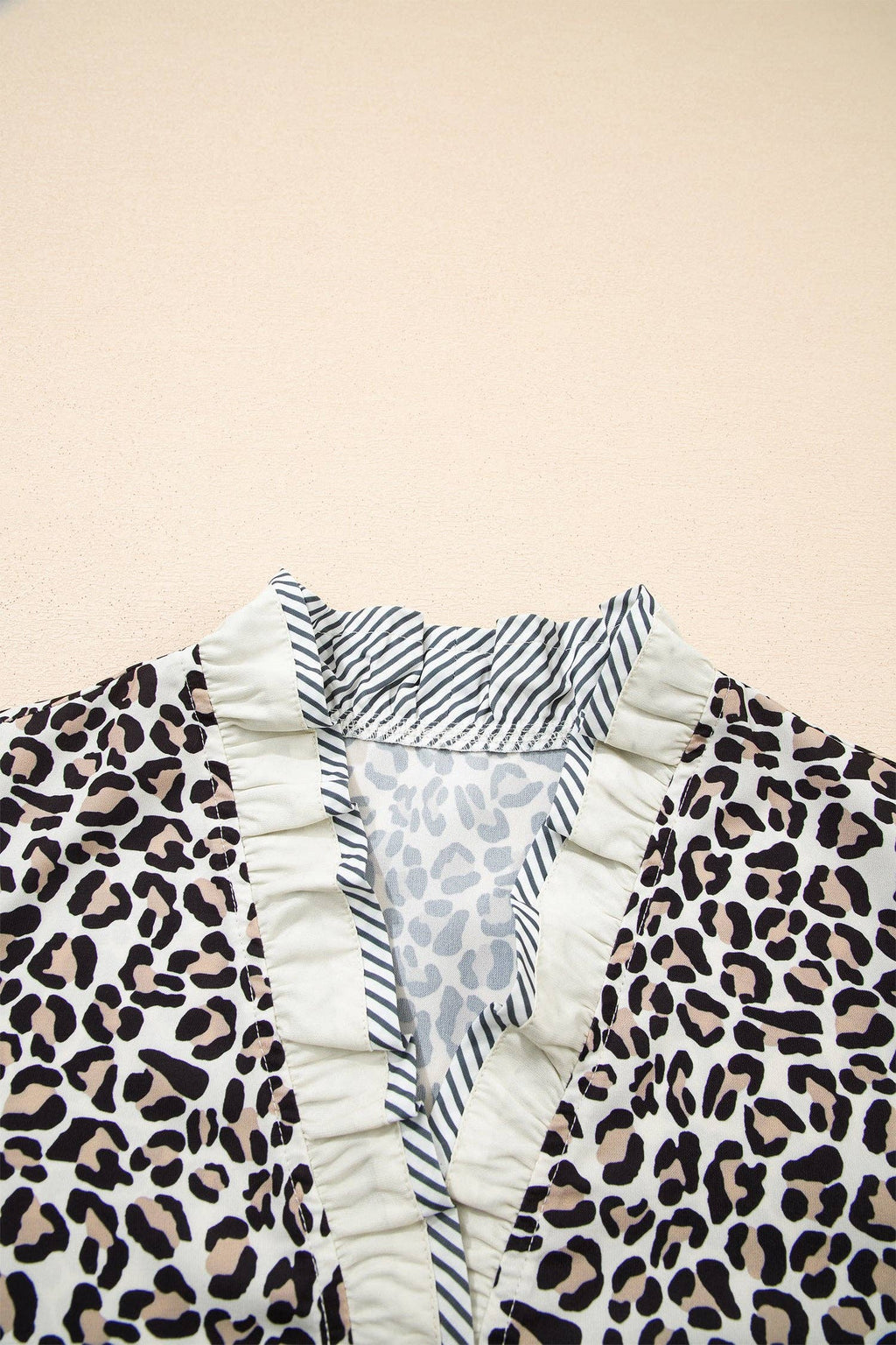 Leopard Print V Neck Blouse with Striped Ruffle Trim