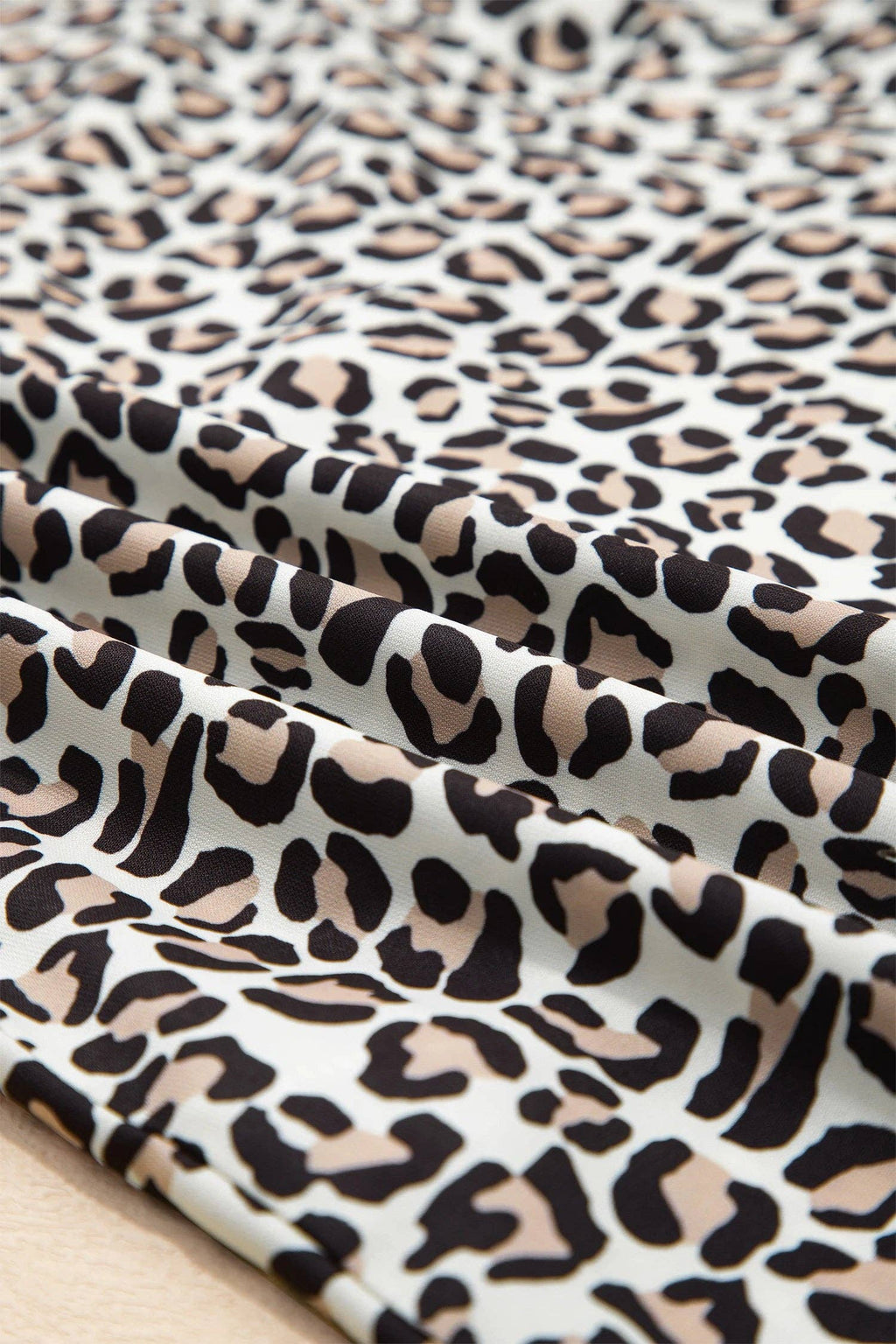 Leopard Print V Neck Blouse with Striped Ruffle Trim: Black / 100%Polyester / L